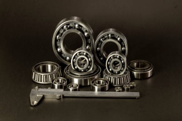 A closeup shot of bearings isolated on a dark background