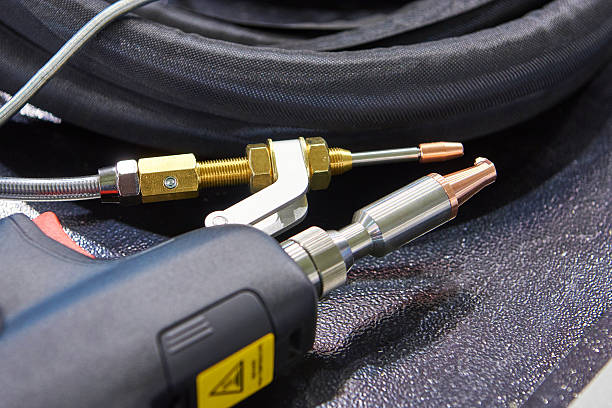 Hand held laser welding machine and metal workpieces